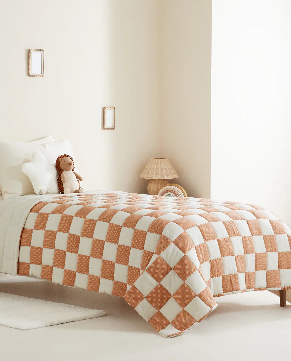 patchwork quilt on bed 