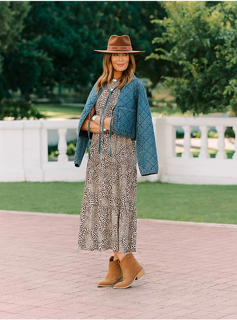 kat farmer for george wearing animal print dress and denim jacket