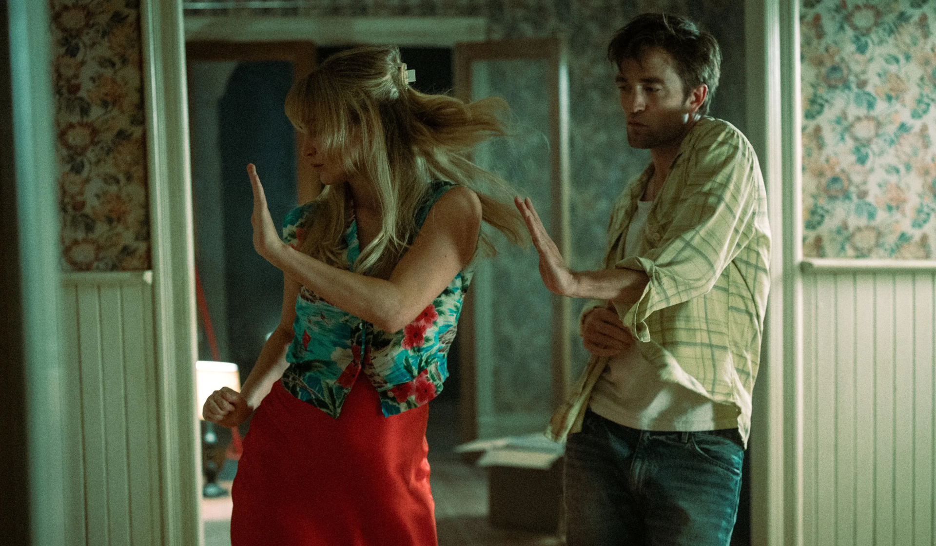 Jennifer Lawrence and Robert Pattinson dancing in Die, My Love