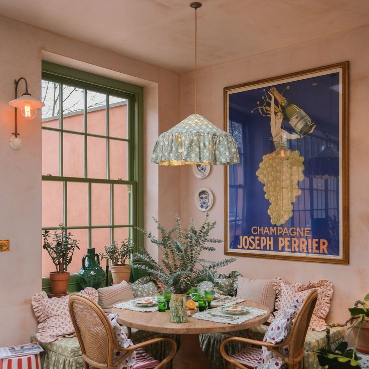 dining table with alice palmer shade over head 