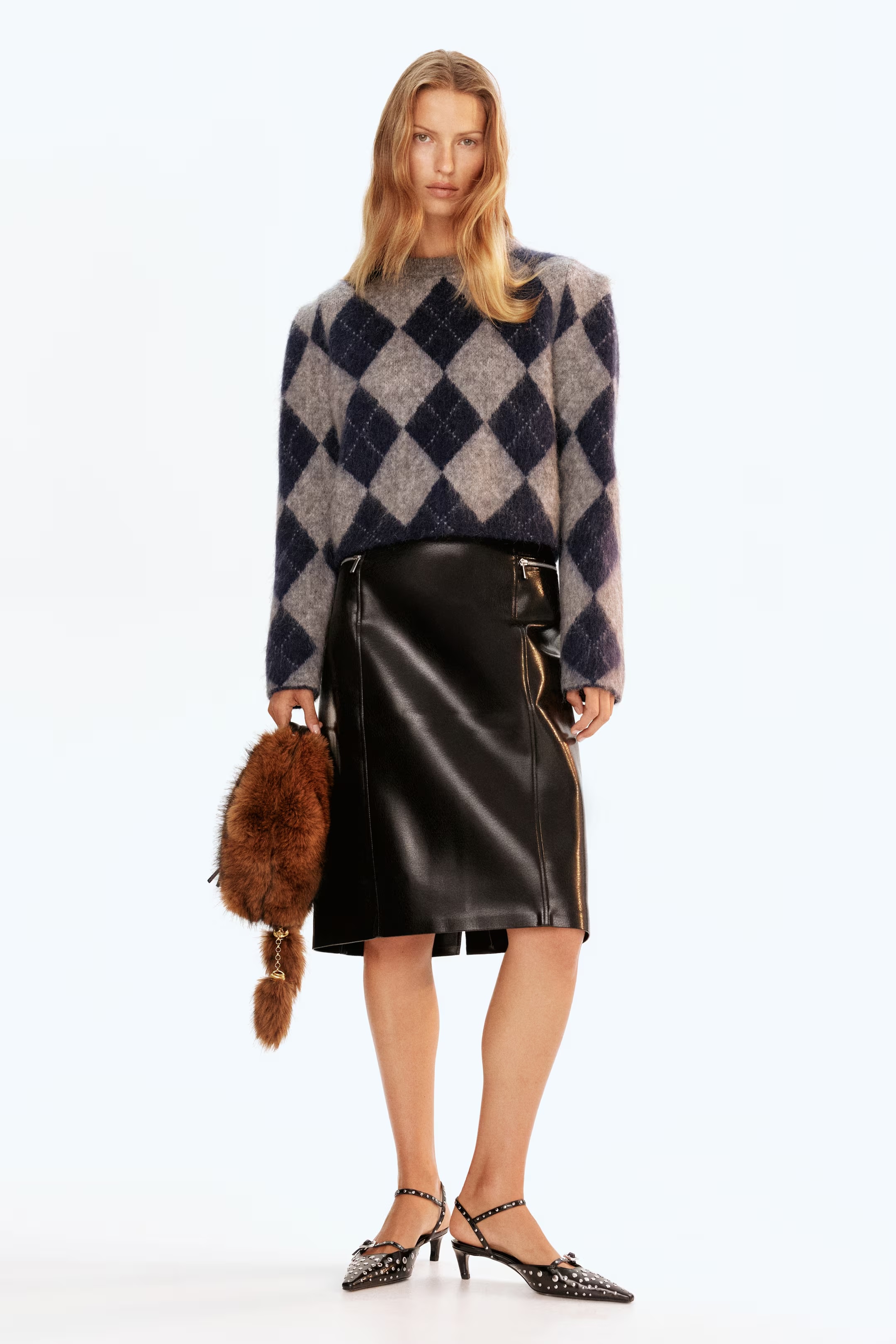 model wearing H&m Mohair-blend jumper and leather skirt