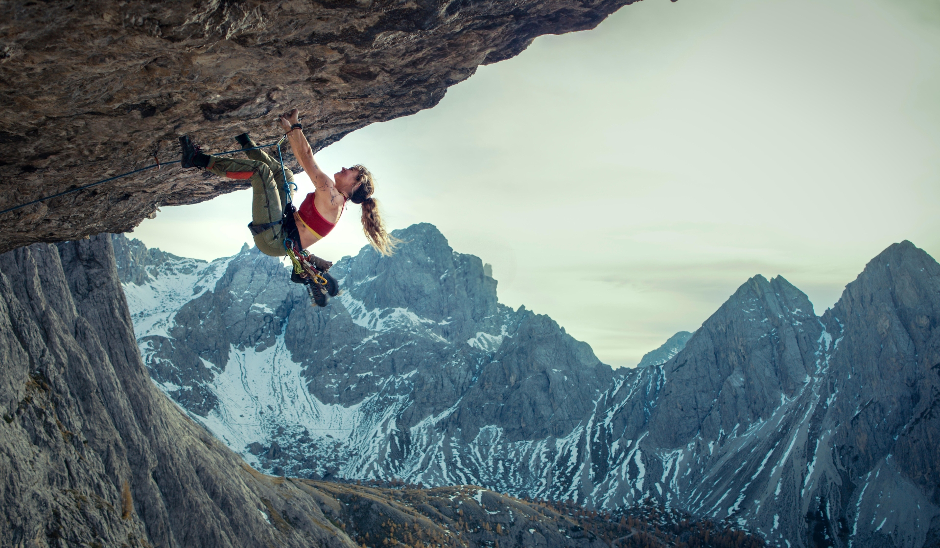 Everything We Know About Cliffhanger Starring Lily James And Pierce Brosnan